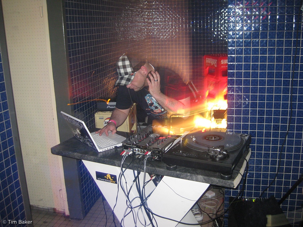 DJ Fusion DJing in a toilet