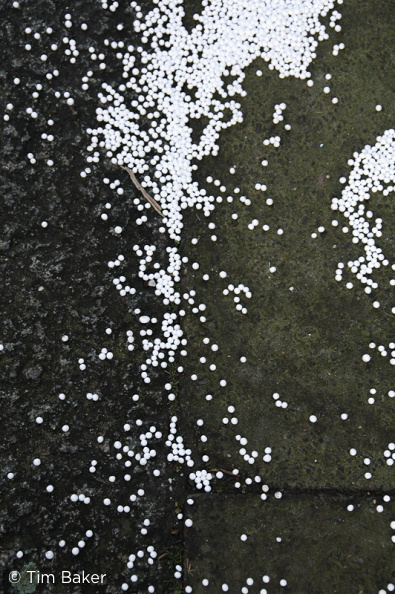 Polystyrene balls on pavement